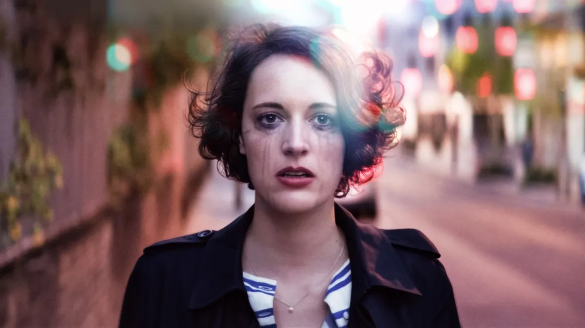 Phoebe Waller-Bridge walks down the street with mascara tear stains in 'Fleabag.'